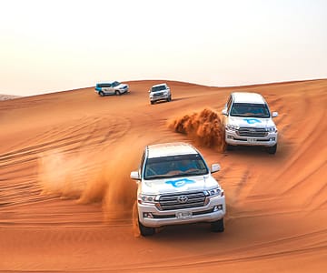 Premium Red Dunes Safari with Camel Ride & 3 Cuisines at Al Khayma Camp Desert safaris